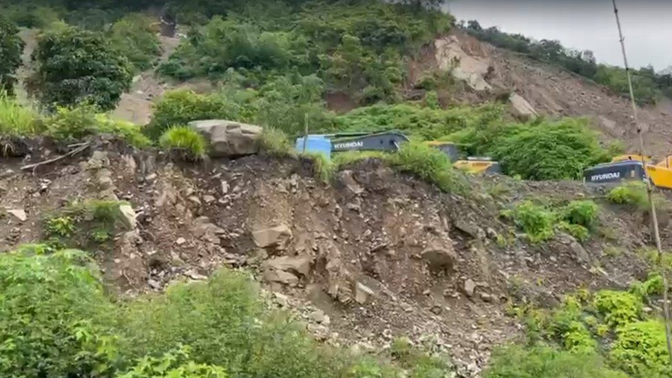 Machinery seen near site of landslide