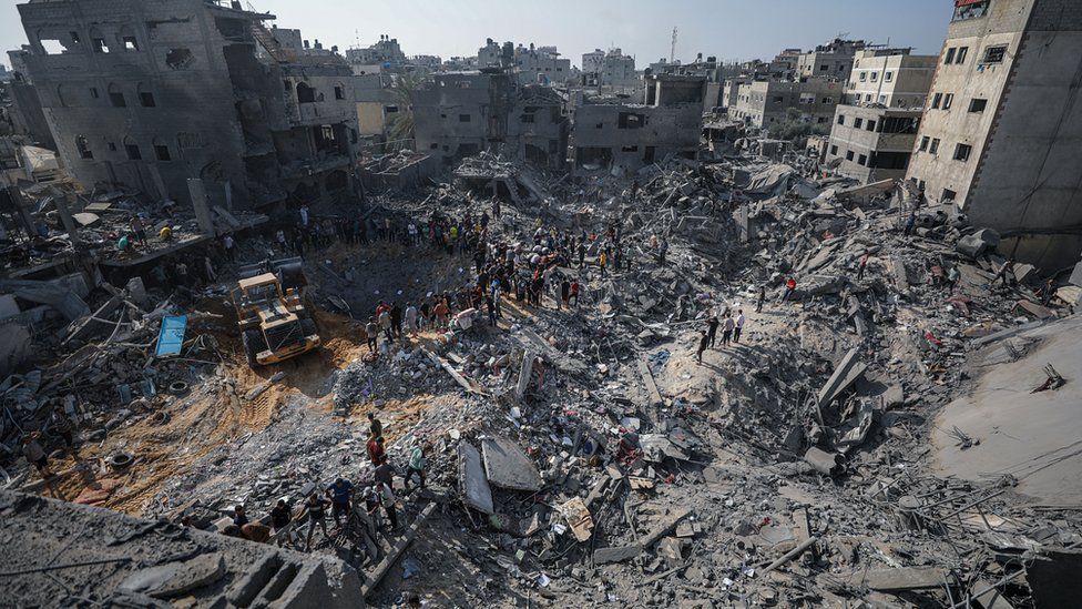 Palestinians search for bodies and survivors among rubble