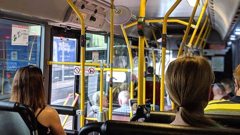 People sitting on a bus
