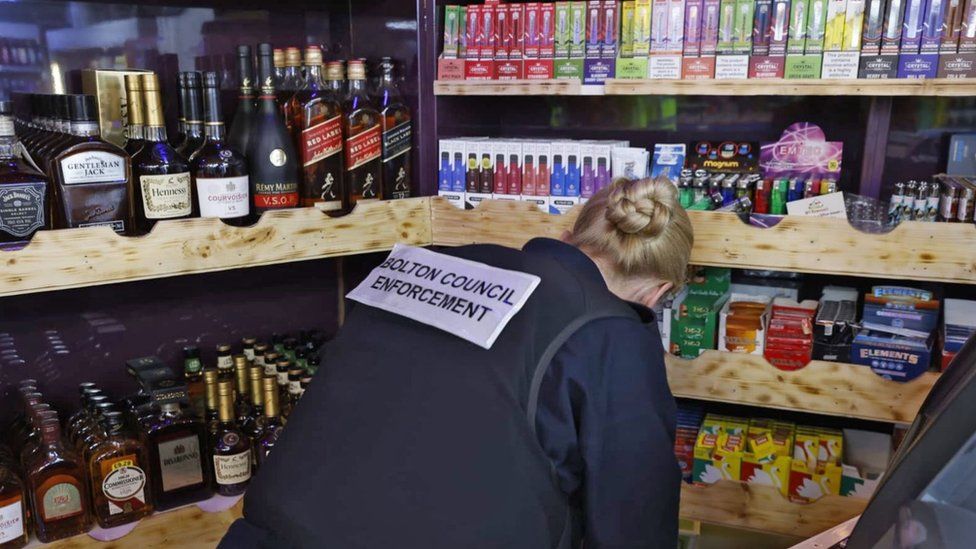 Trading Standards officer searches shop