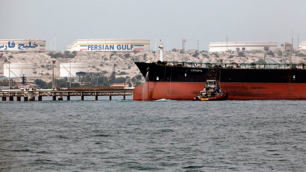 An oil tanker docking at Iran’s Port of Kharg Island oil terminal