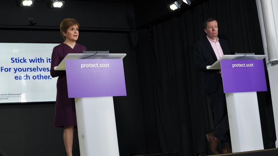Ms Sturgeon, seen here with Jason Leitch, gave regular news conferences throughout the pandemic