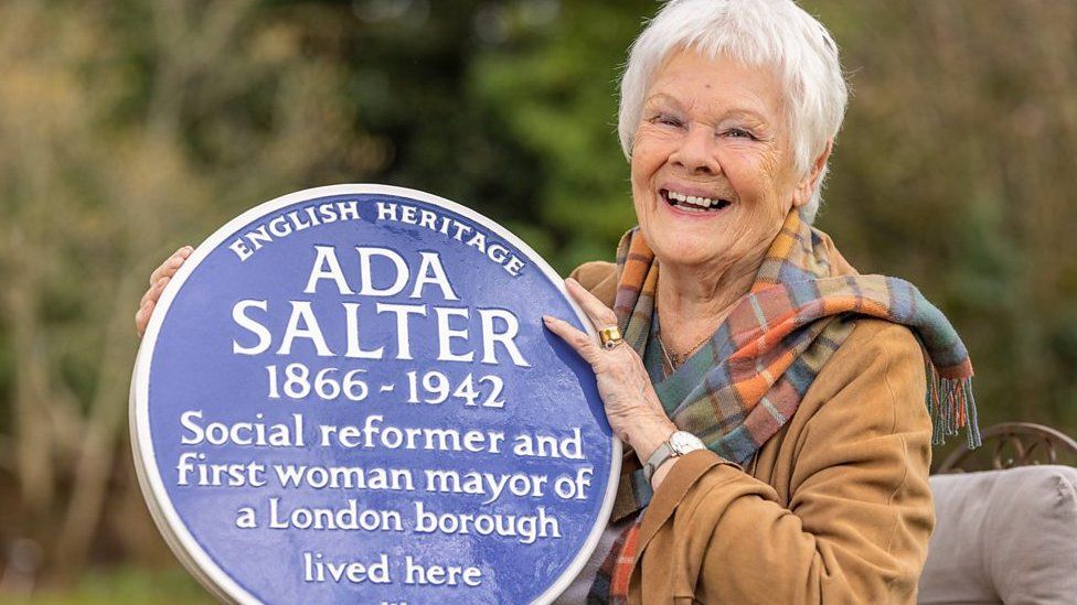 Dame Judi Dench with one of London's 1,000 blue plaques