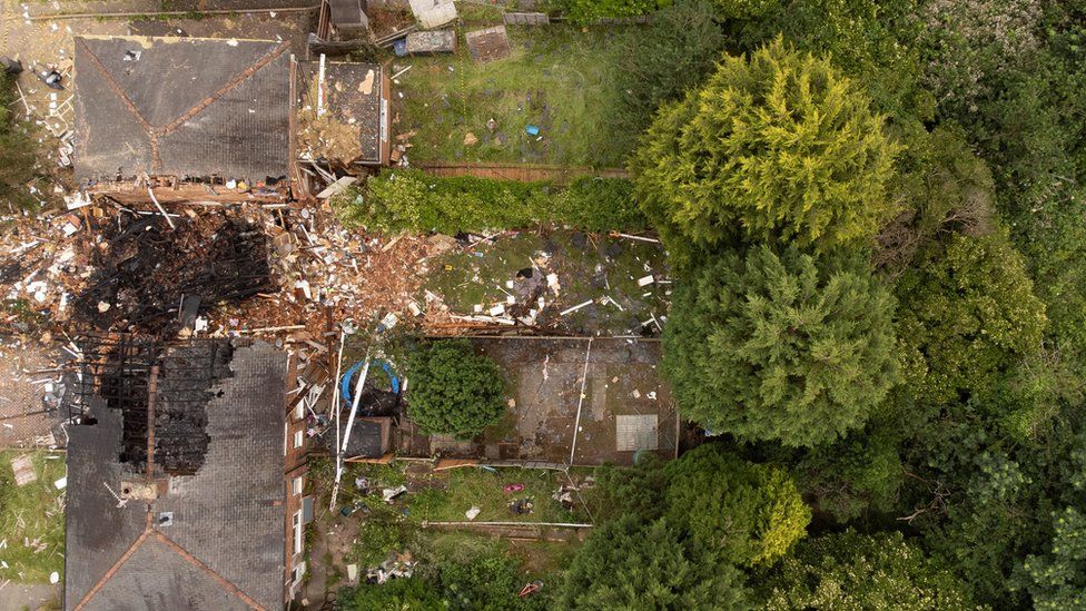 The scene in Dulwich Road, Kingstanding, Birmingham, where a man suffered life threatening injuries after an explosion destroyed a house on Sunday and caused damage to other properties and vehicles nearby. Picture date: Monday June 27, 2022.