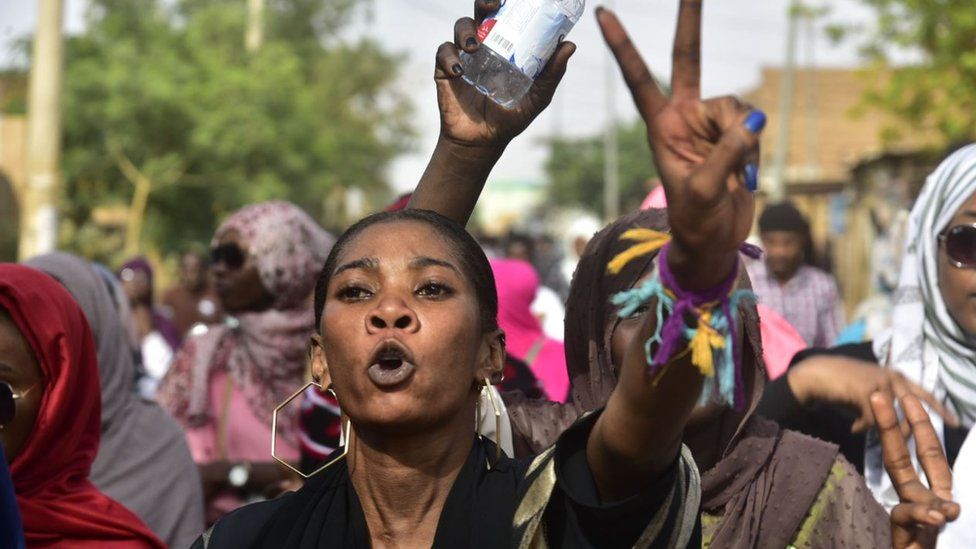 Sudanese protesters take part in a demonstration the Sudanese capital's twin city of Omdurman, to mourn dozens of demonstrators killed last month in a brutal raid on a Khartoum sit-in, on July 13, 2019.