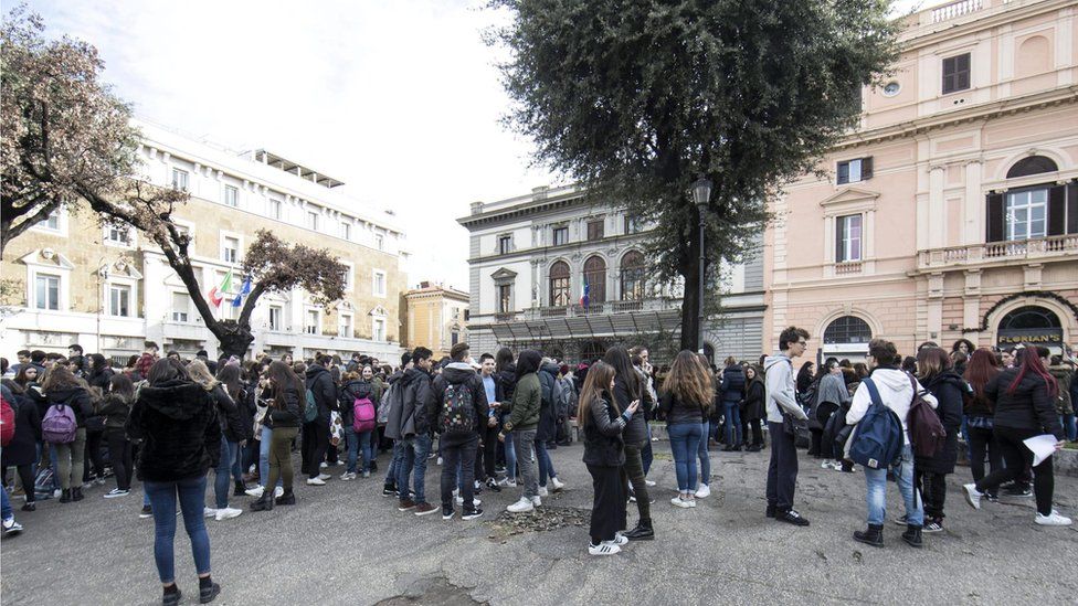 Students and teachers stand outside Machiavelli school after a 5.6 magnitude earthquake struck in Rome, Italy, on 18 January 2017