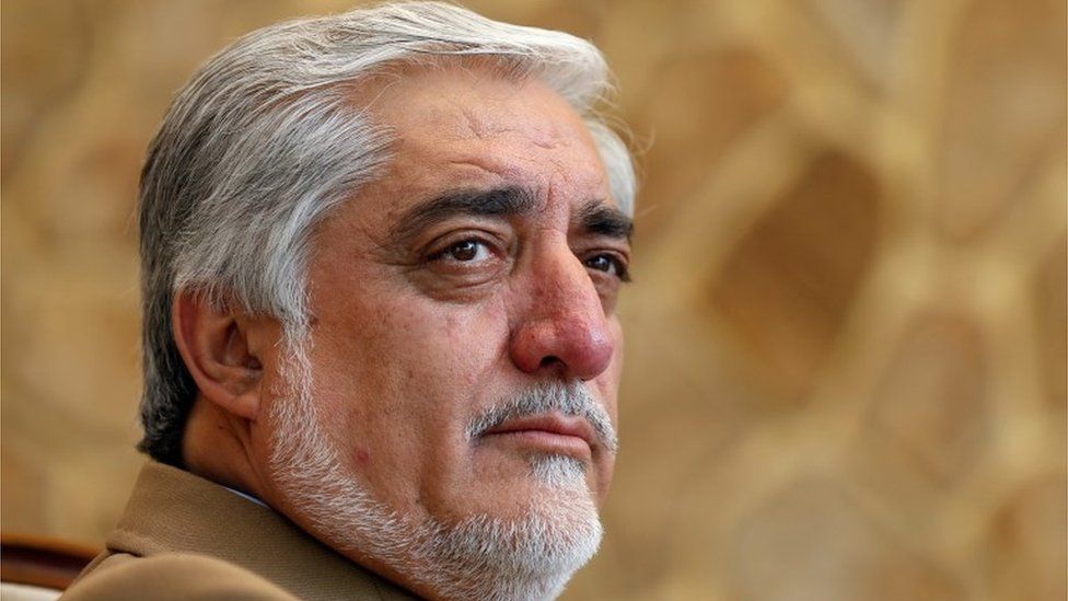 Afghanistan"s presidential candidate Abdullah Abdullah speaks during an interview in Kabul, Afghanistan