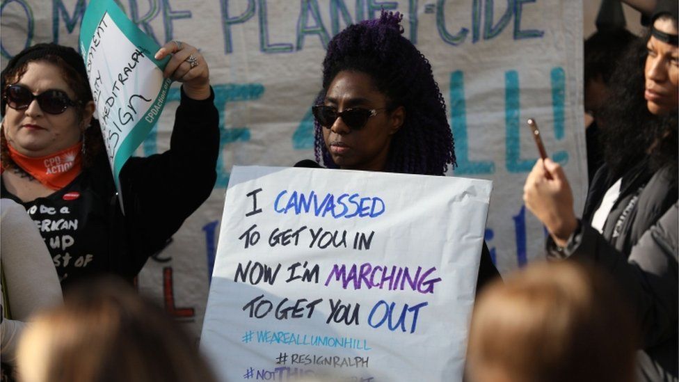 Protesters rally against Virginia Governor Ralph Northam outside of the governor's mansion in downtown Richmond, Virginia