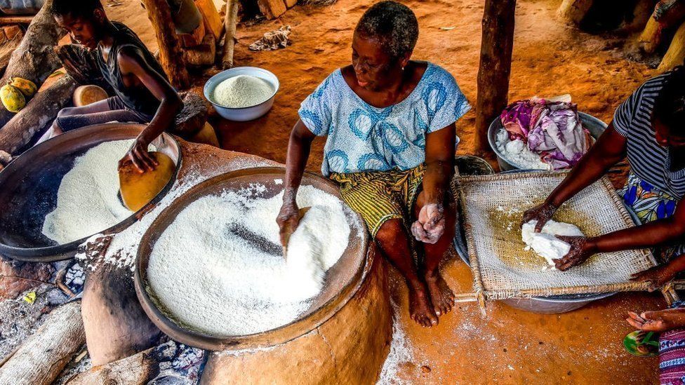 Processing cassava into flour on the outskirts of Lome, Togo