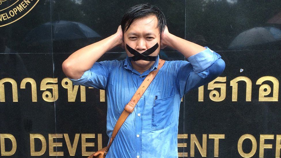 Thai journalist Pravit Rojanaphruk protesting after the coup in May 2014
