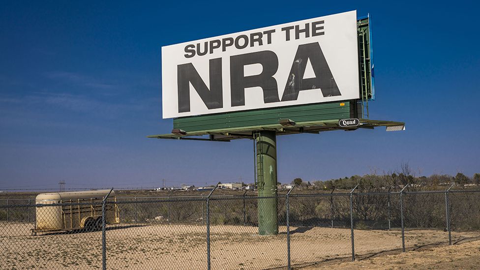 NRA, National Rifle Association, sign promotes membership of NRA, Texas