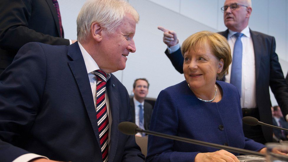 Angela Merkel meets Horst Seehofer, leader of the CDU's Bavarian ally, the Christian Social Union (CSU) on 26 Sept
