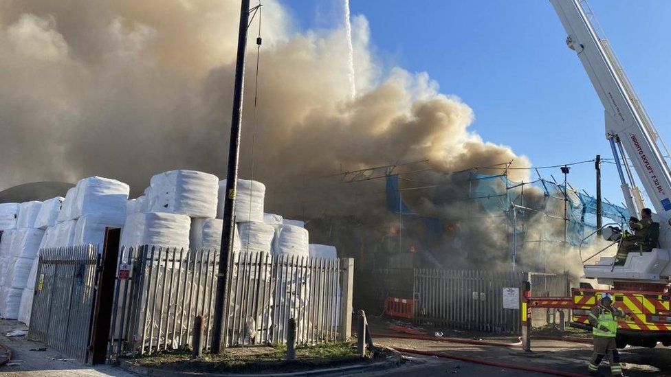 Large amounts of smoke pouring out of a recycling centre in Essex.