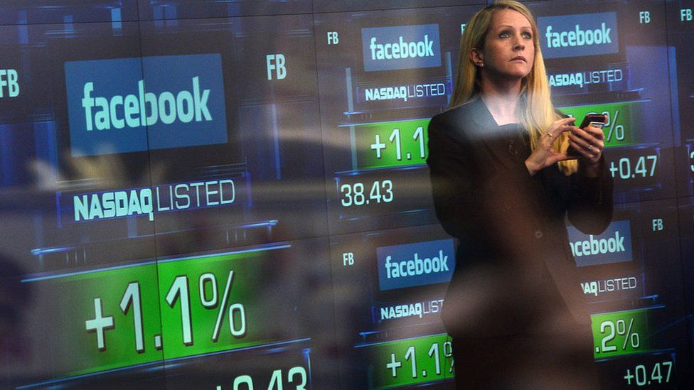 Stock exchange screen showing Facebook shares go live