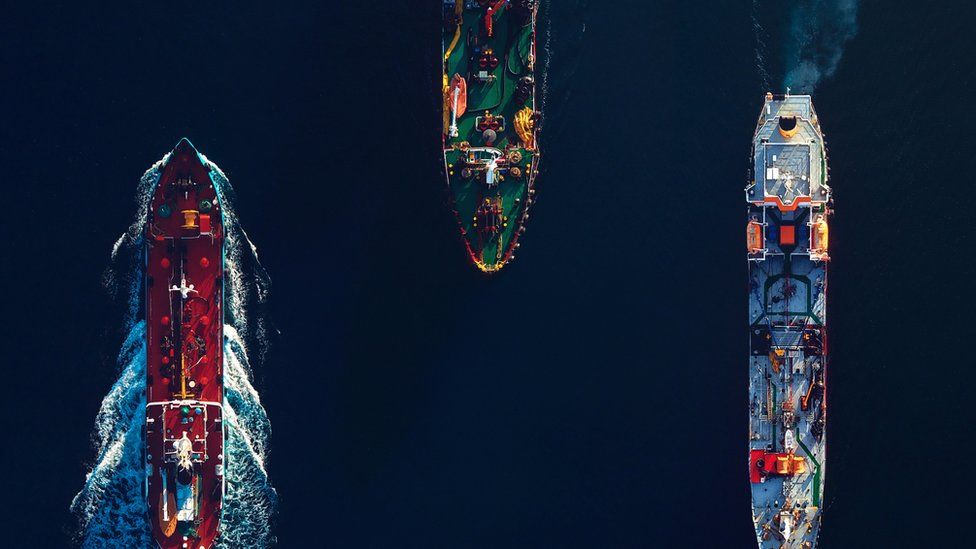 Three commercial ships from above