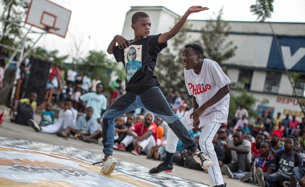 Twelve-year-old Kennedy Mukadi Chilobo (L) competes in a team dance battle at the Goma Dance Festival in Goma, east of the Democratic Republic of the Congo, on April 30, 2017. In its first year, the festival aims to support and encourage young Congolese to express themselves through the medium of dance.