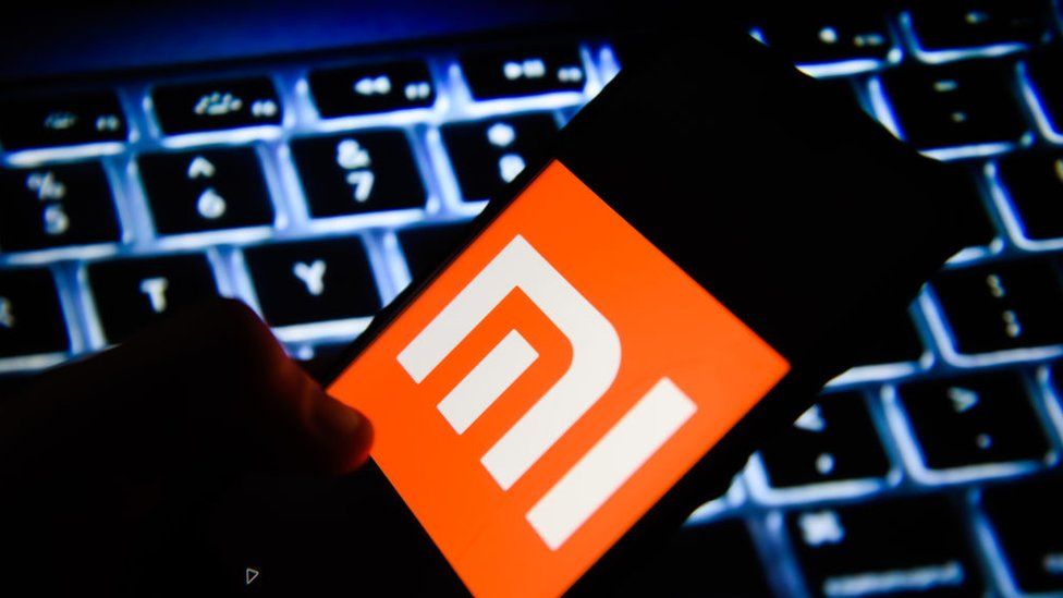 In this photo illustration, the Xiaomi logo is seen displayed on an Android mobile phone.
