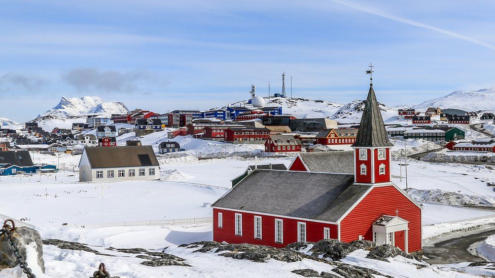 Annaassisitta Oqaluffia, church of our Saviour among snow in Historical center of Nuuk, Greenland