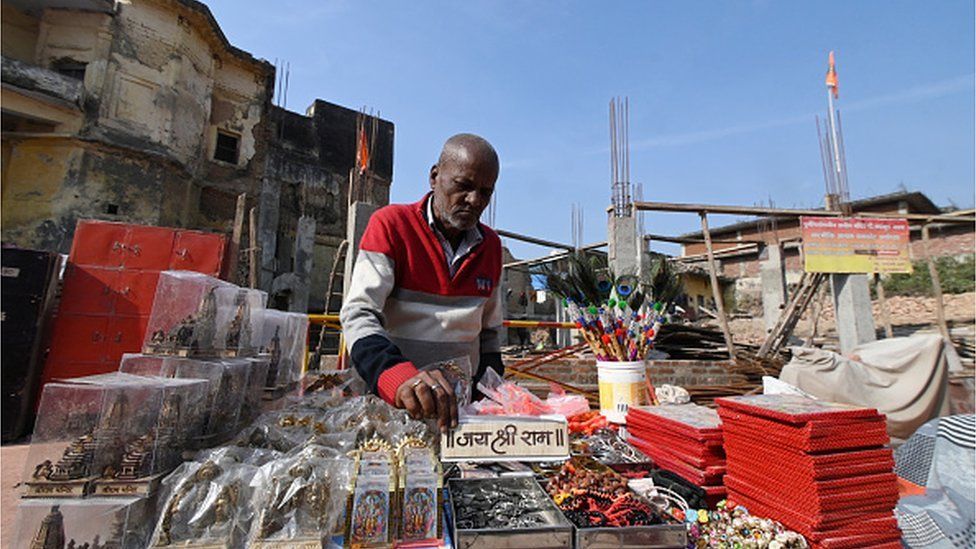 Local vendor named Udaikant Jha selling religious items near Dashrath Mahal on December 22, 2023 in Ayodhya, India.