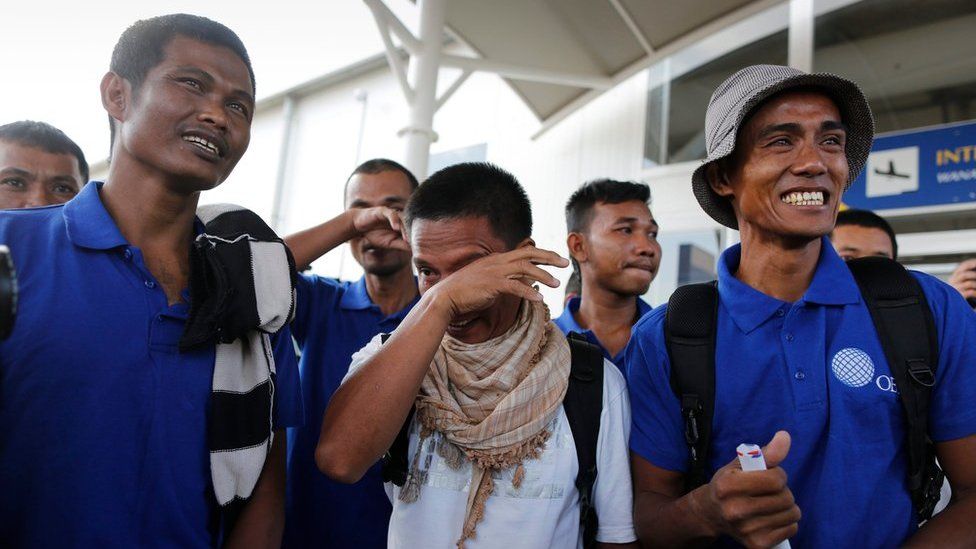 Unidentified sailors react upon their arrival at the Jomo Kenyatta International Airport after they were released by Somali pirates, Nairobi, Kenya, 23 October 2016.