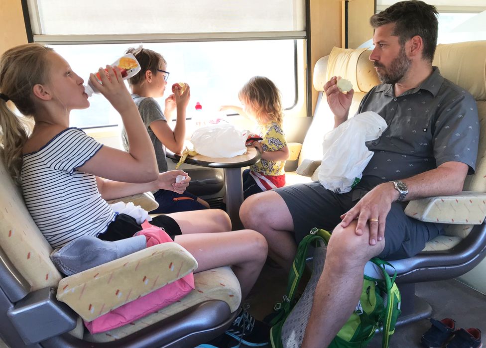 Anna Hamno Wickman's family on a train