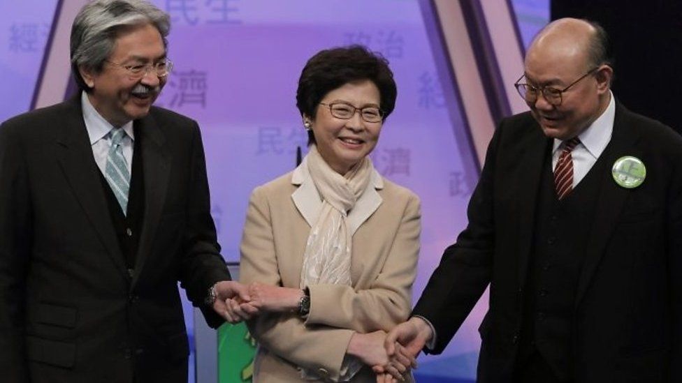 From left, John Tsang, Carrie Lam and Woo Kwok-hing ahead of a debate on 14 March