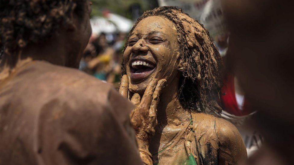 A group of people participates in a rally to promote climate protection in Rio de Janeiro, Brazil, 29 November 2015