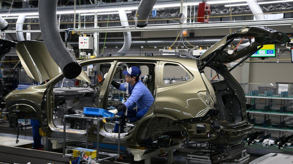 A worker on a production line at the Subaru plant in Ota, Gunma Prefecture, Japan.