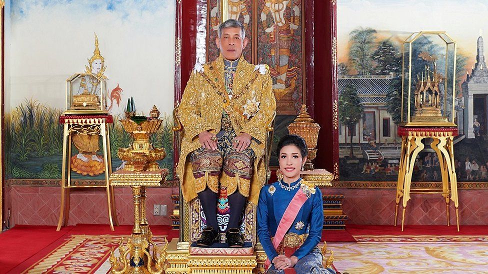 Thailand's King Maha Vajiralongkorn and General Sineenat Wongvajirapakdi, the royal noble consort pose at the Grand Palace in Bangkok, Thailand