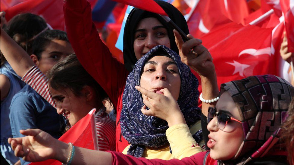 Supporters of Turkish President Tayyip Erdogan react during an election rally in Diyarbakir, Turkey June 3, 2018
