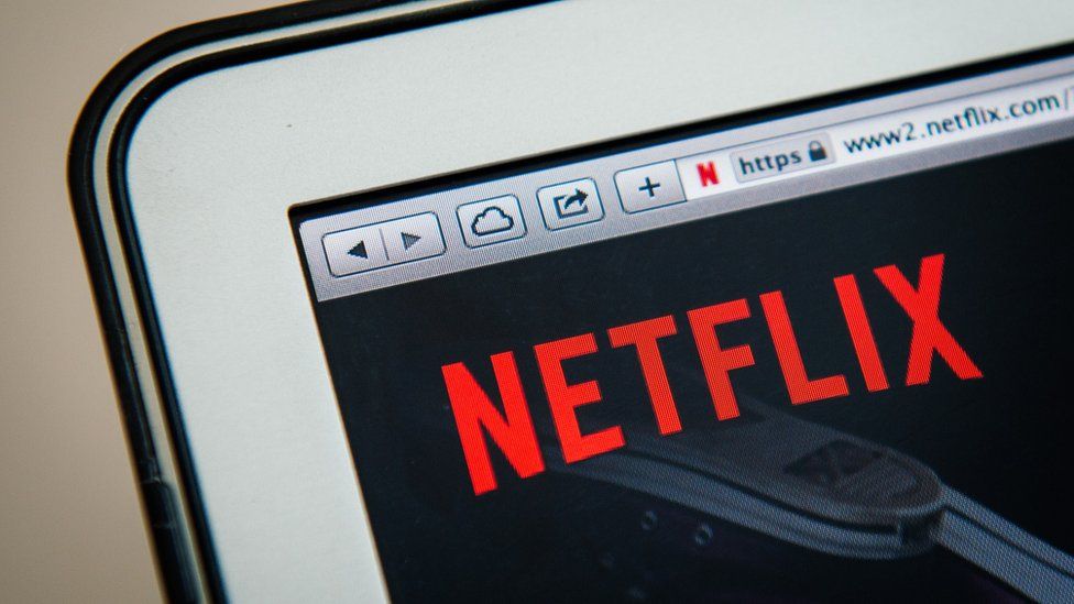 Netflix logo on a laptop screen