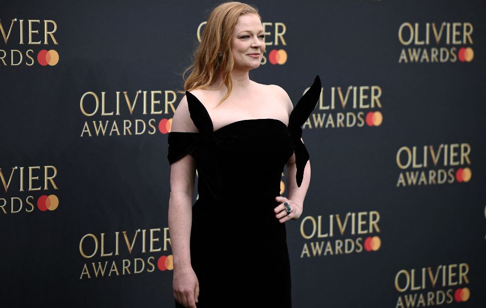 Australian actor Sarah Snook poses on the green carpet upon arrival to attend The Olivier Awards at the Royal Albert Hall in central London on April 14, 2024.