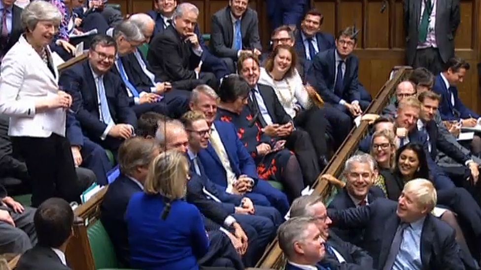 Boris Johnson looks on as Theresa May addresses the Commons