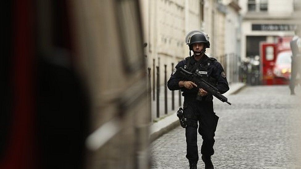 Armed police officer on patrol in Paris