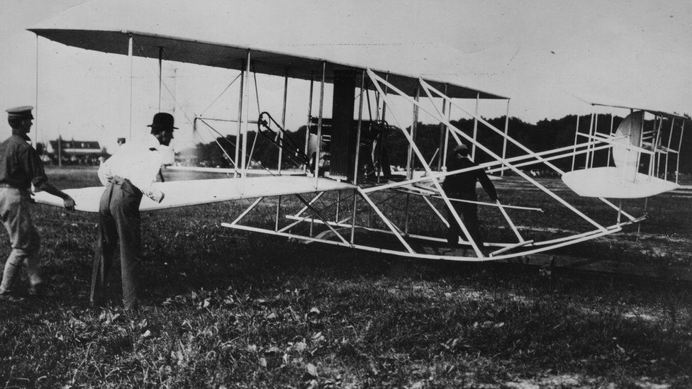 Orville Wright (right) (1871 - 1948) checking a Wright 'Flyer' biplane at Fort Myer, Virginia, June 1909