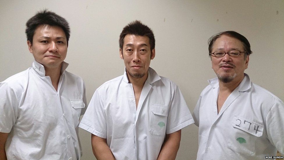 Abattoir workers at the Shibaura meat market