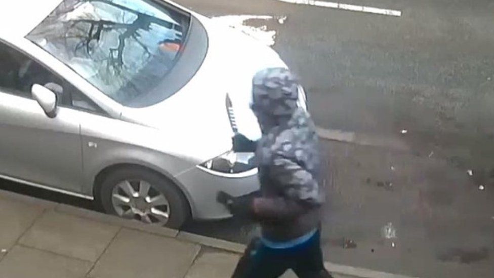 Handout CCTV grab dated 21/01/21 issued by West Midlands Police of Michael Ugochukwu allegedly armed with a blade at the scene in Linwood Road, Handsworth.