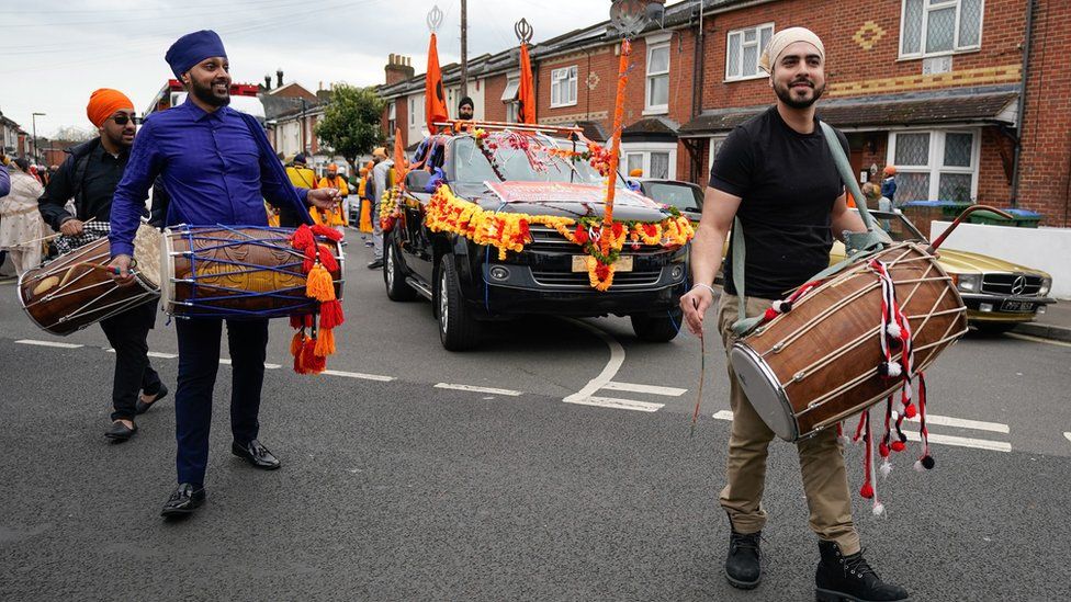 People take part in the Nagar Kirtan procession through the city centre in Southampton