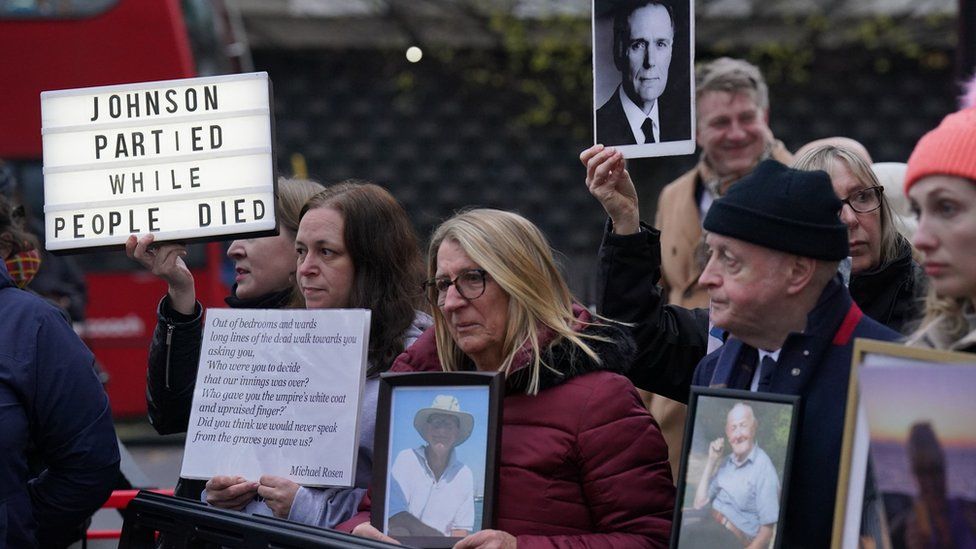 Protesters outside the UK Covid inquiry