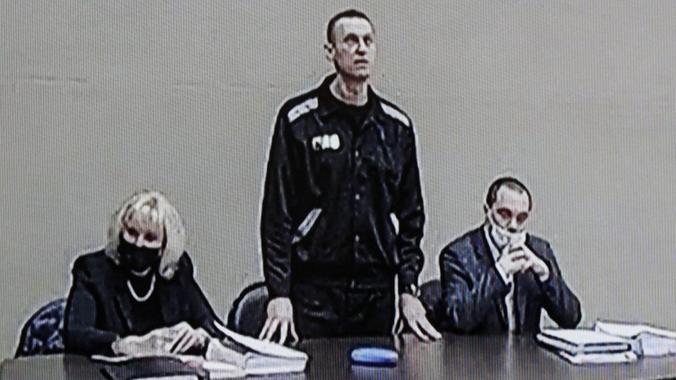Navalny stood in the makeshift court in Pokrov jail as the verdict was read out