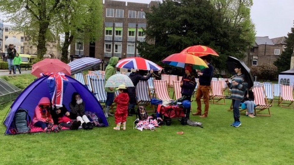 Crowds in wet weather in Chichester