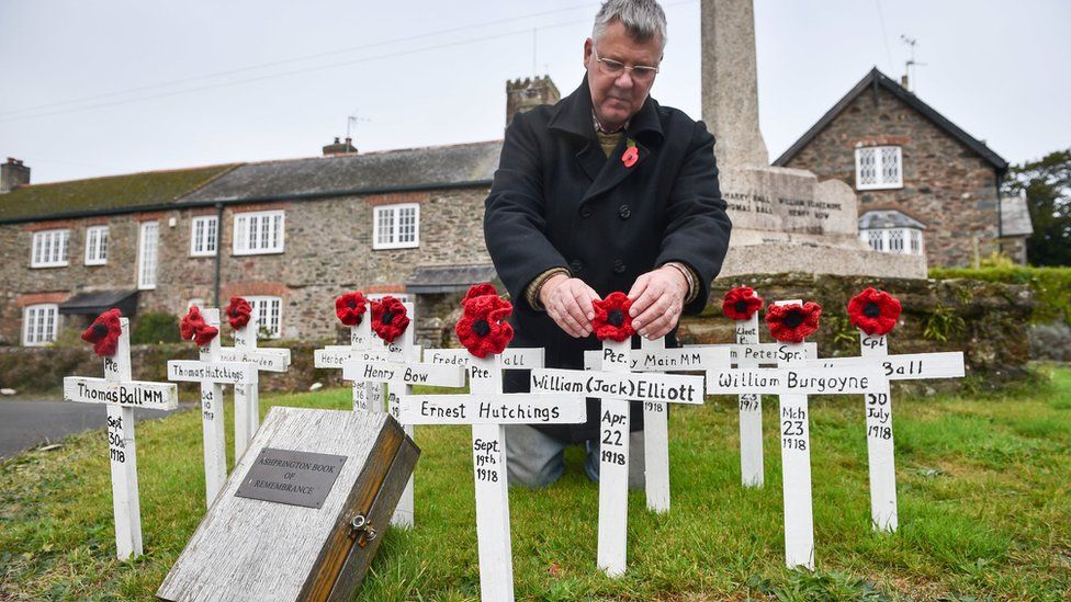 Local councillor Laurence Green tends to hand-made wooden crosses and hand-knitted poppies, which are placed on the war memorial in the Devonshire village of Ashprington, where he has adorned the small memorial with crosses of those that died in the Great War from the Ashprington Parish. Villagers tend the memorial and have made a book featuring details of parishioners that served and died during the First World War.
