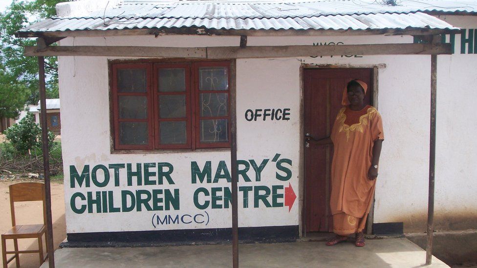 Mary Mangwiza outside Mother Mary's Children Centre in Malawi