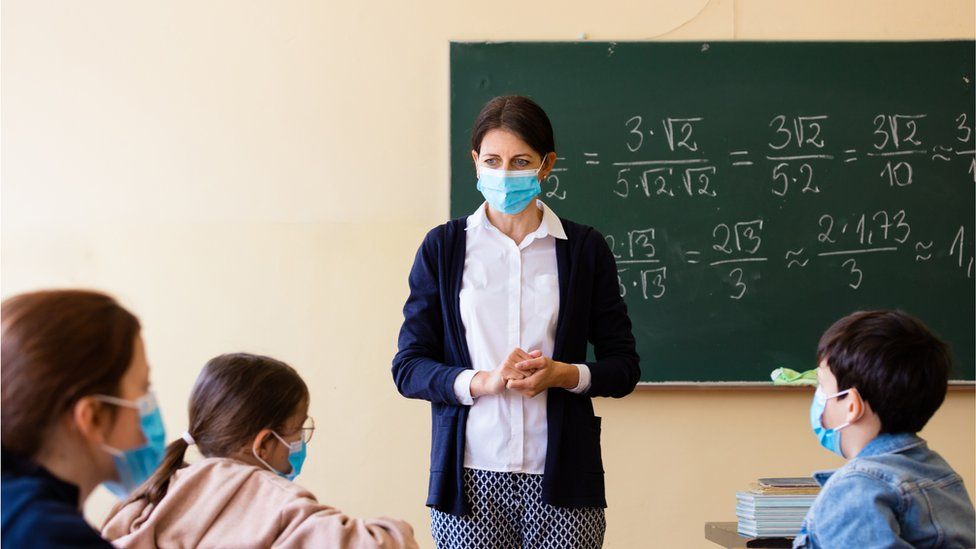 teacher in class with mask