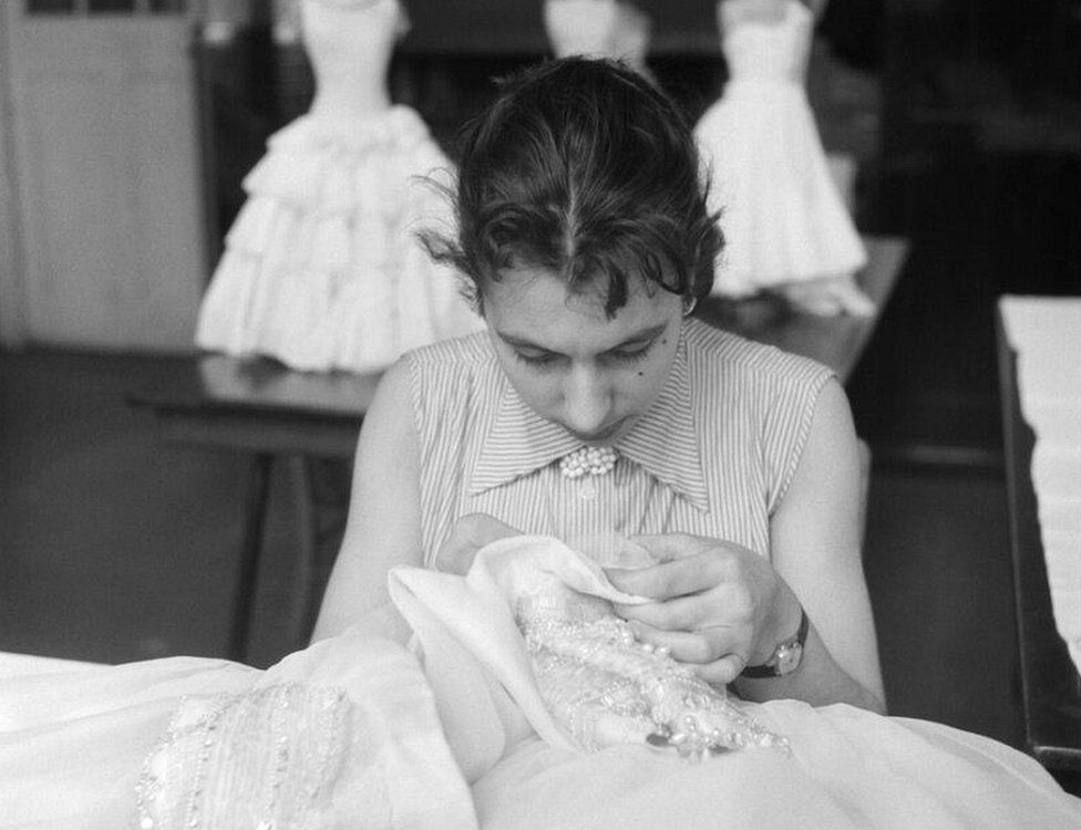 Dressmaking student doing hand embroidery at Shoreditch College, 1958