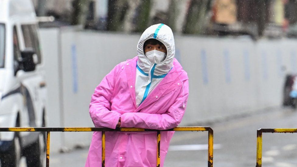 A worker wearing protective gear in Shanghai.