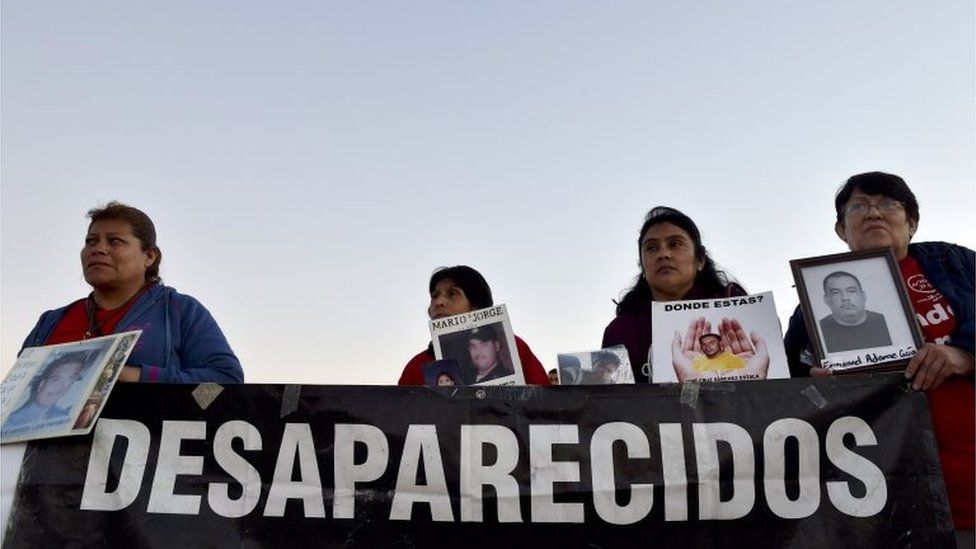 Mothers of missing sons protest near Ciudad Juarez's international airport on the eve of the arrival of Pope Francis, on 16 February, 2016.