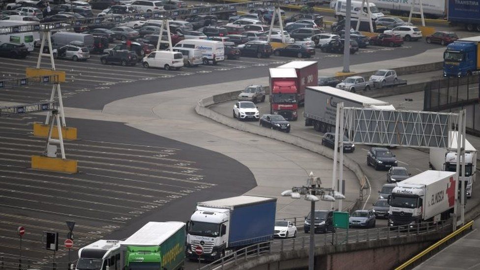 Cars and freight unload from a ferry at the Port of Dover in Dover, Britain
