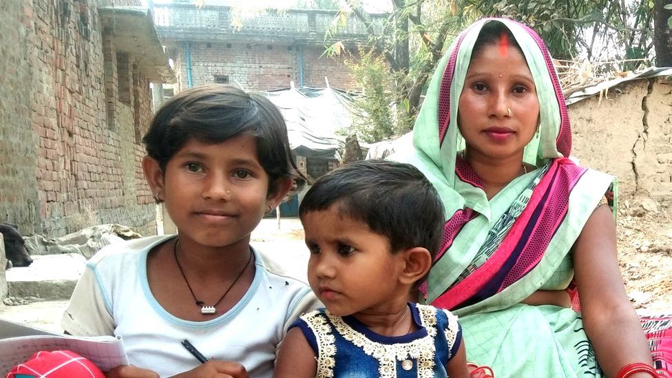 Laxmi (left) with her mother and sister