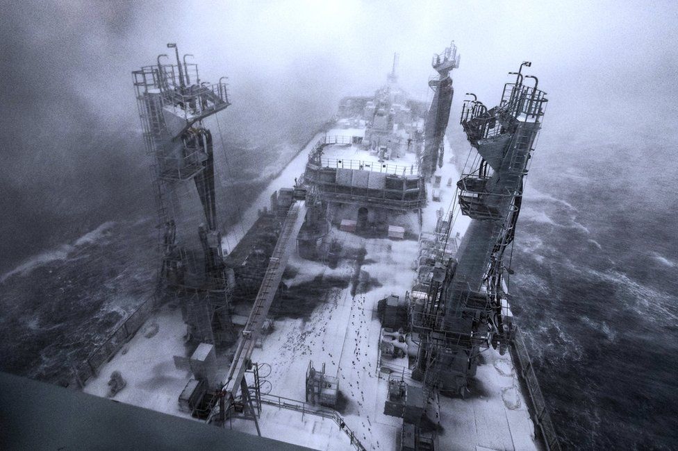 Snow can be seen on the deck of the RFA (Royal Fleet Auxiliary) Tidespring, during bad weather